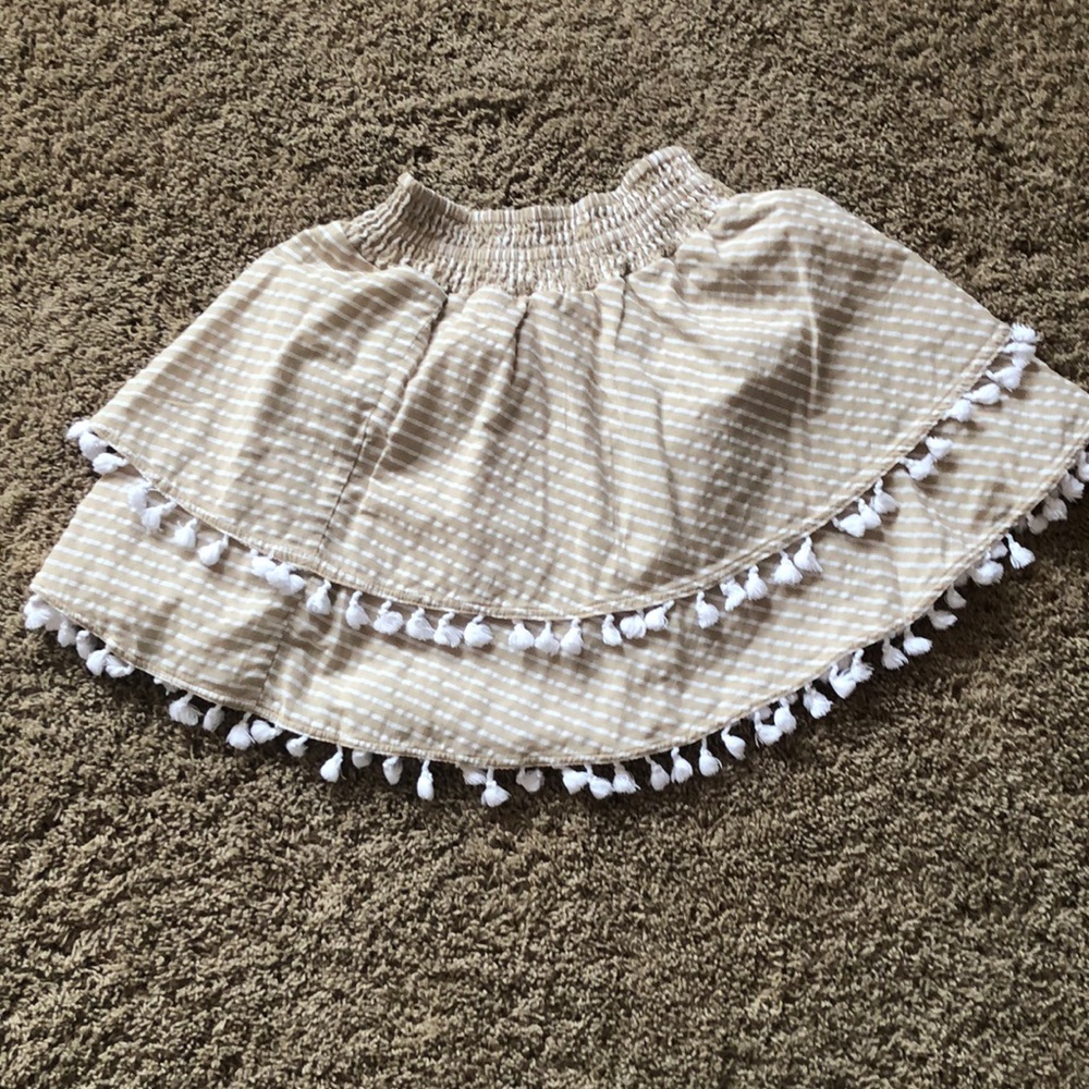 Tan and white tassel skirt